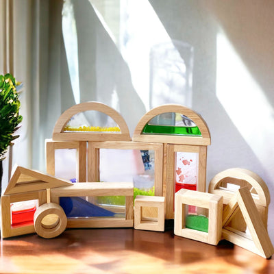 Wooden sensory blocks with liquid, sand with shells or beads