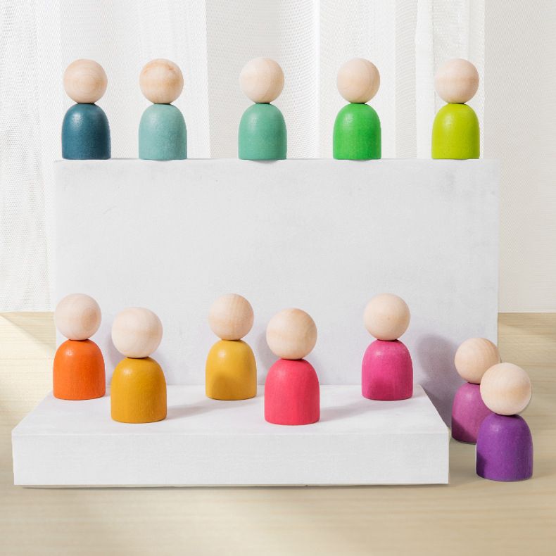 Montessori inspired Wooden colour sorting rings and mini figurines.  Early learning toy