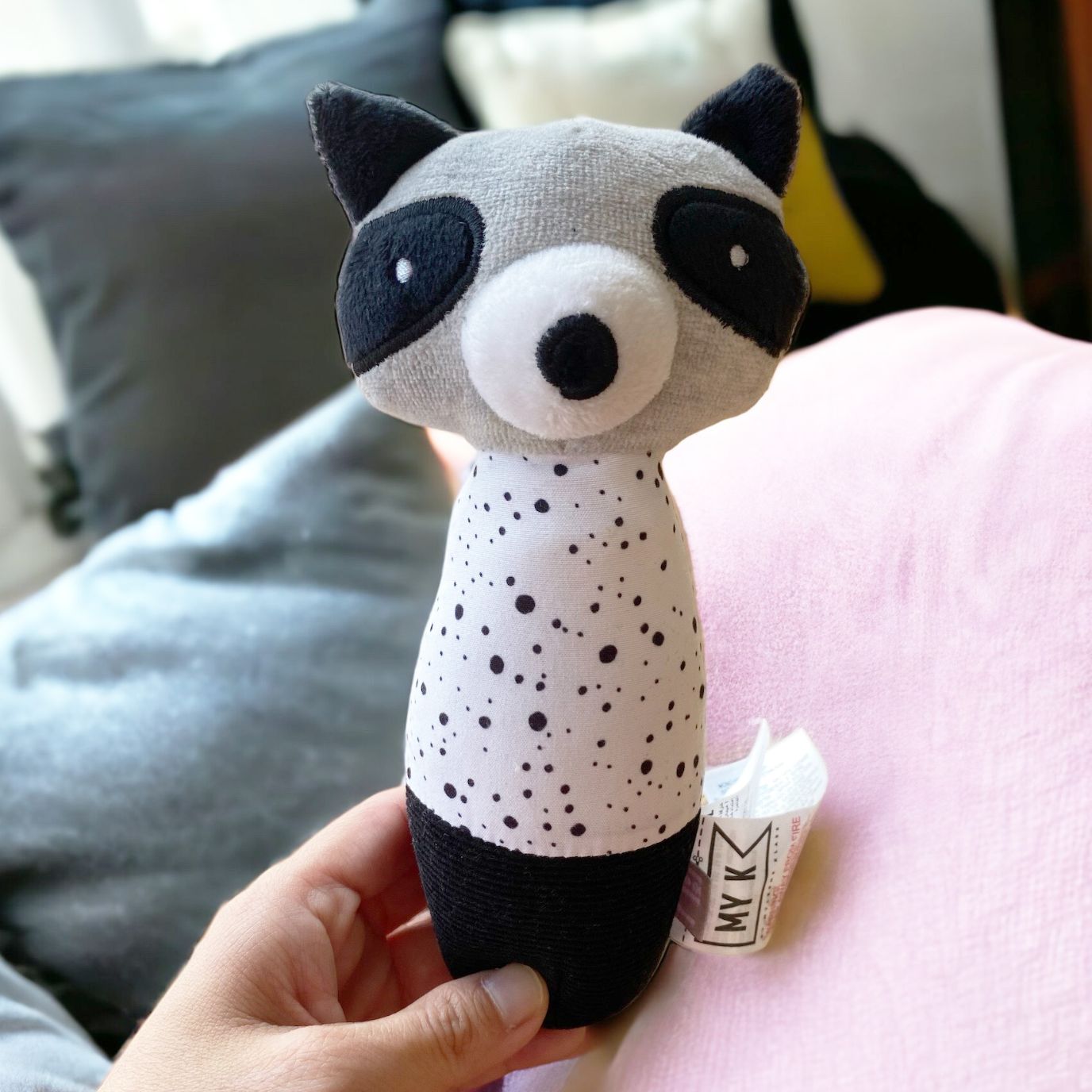 Mothercare black and white raccoon squeaker baby toy