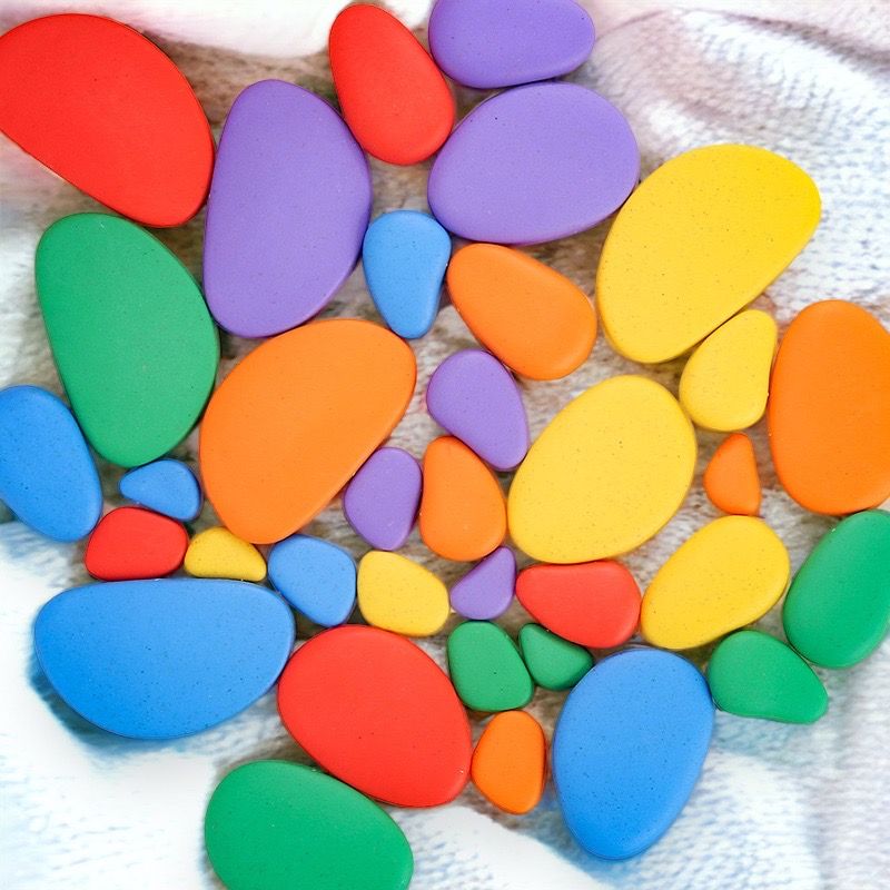 Shapes Puzzle. Stacking Colour Flat Pebbles. Educational Toy