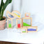 Wooden sensory blocks, liquid with fish, sand with shells or beads with sound