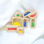 Wooden sensory blocks, liquid with fish, sand with shells or beads with sound
