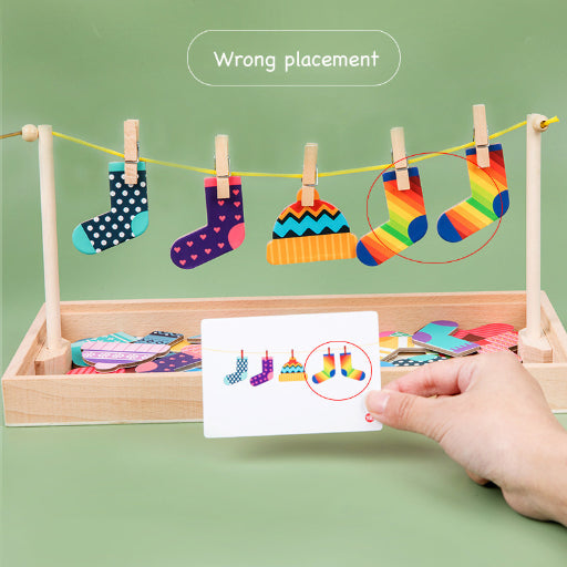 Wooden toy snowman's clothes hanging Sequence & Logic game